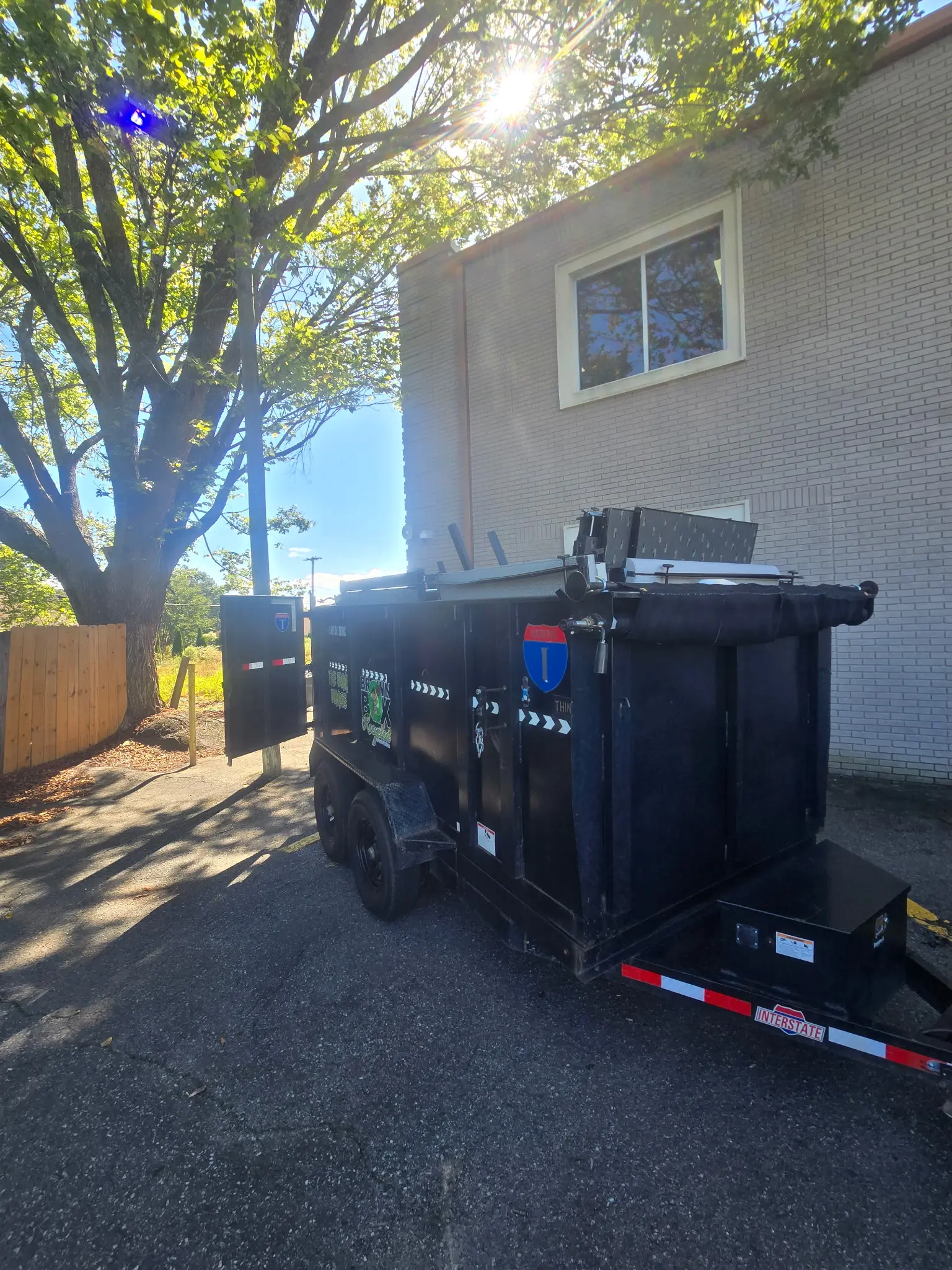 Brown Box Recycled junk removal and recycling trailer