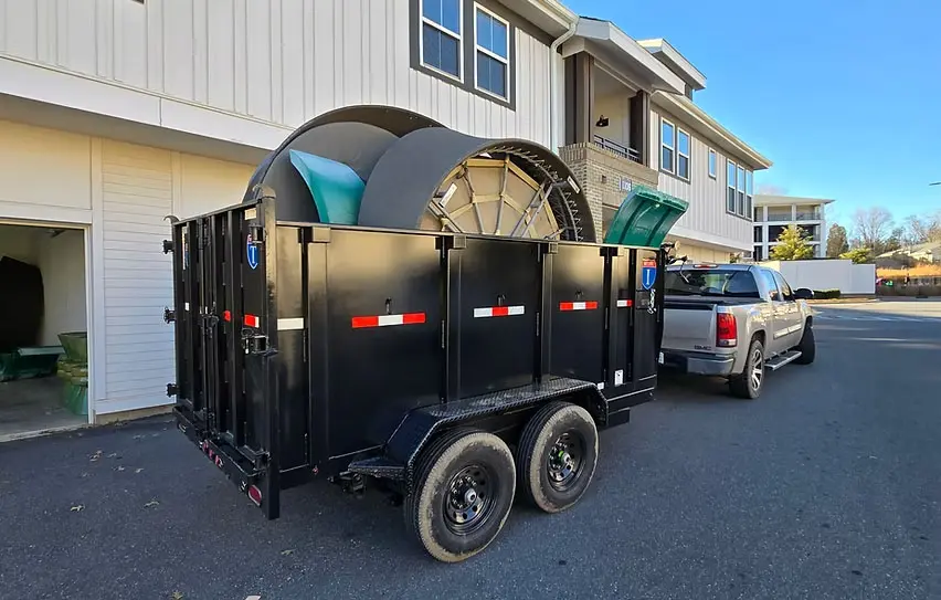 Junk removal hauling debris trailer in Charlotte, NC